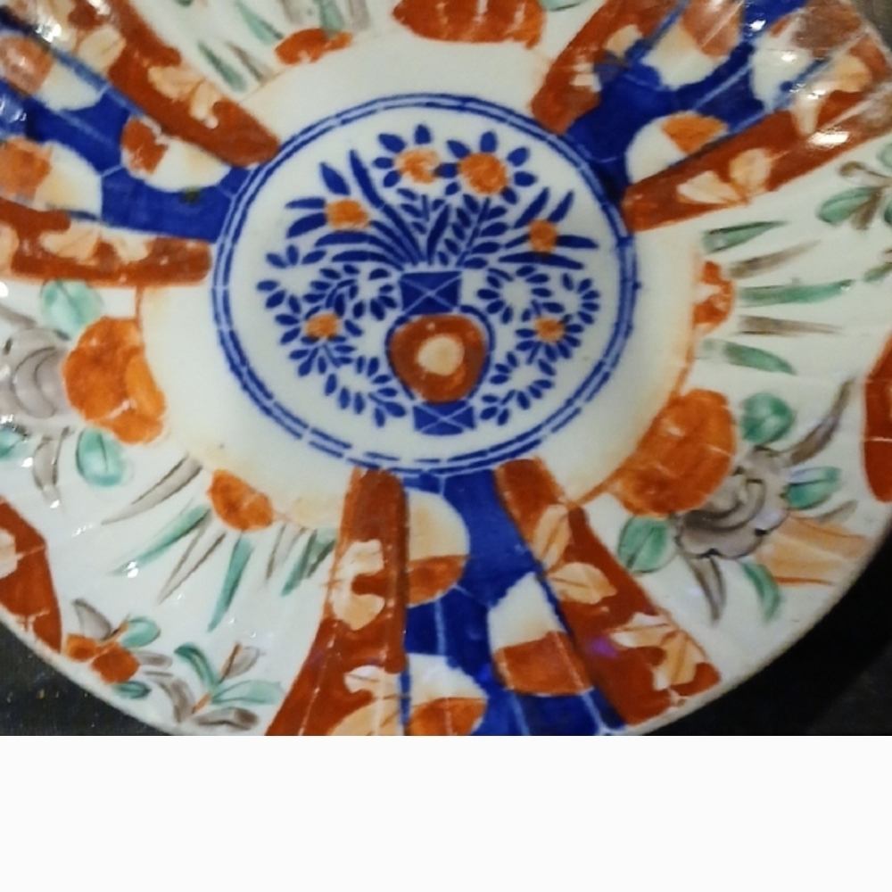 Floral Ceramic Plate with Blue and Orange Design